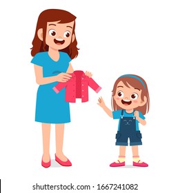 happy mother buy clothes for her kid