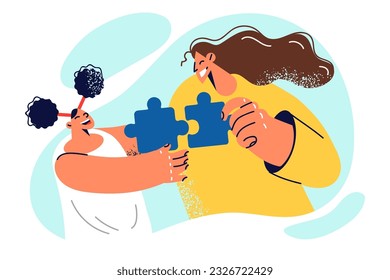 Happy mother and daughter family solve puzzles together and laugh, connecting puzzle pieces. Positive family of young woman with teenage girl symbolizes correct upbringing of children.