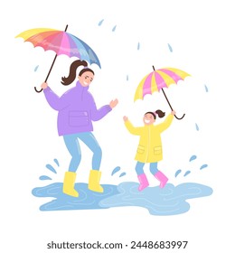 Happy mother and daughter jumping in puddle at springtime in flat cartoon design. Young mom and kid in raincoats and under umbrellas playing in splashing drops puddle at rain. Vector illustration