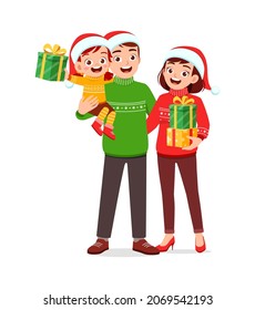 happy mother father and kid celebrate christmas