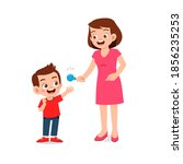 happy mother give candy and sweets to his boy and girl kid