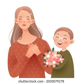 Happy mother and son. The boy gives his mother a bouquet of flowers.