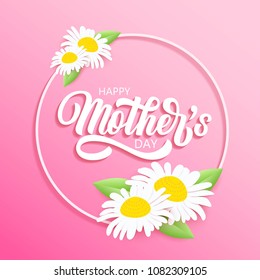 Happy Mother's day brush hand lettering in circle frame, with beautiful camomile flowers, daisy with green leaves on pastel pink background. Vector paper art holiday illustration.