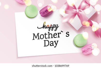 Happy mother`s day card with colorful macarons and gift box on pink background. Top view. Vector illustration