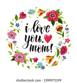 Happy Mothers Day greeting card. Elegant lettering and red heart in flower frame. I love you mom. Flower wreath with wild flowers