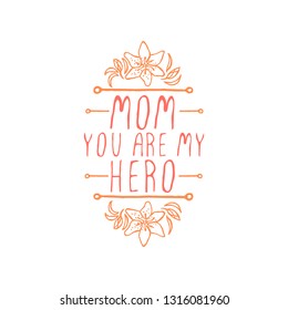 Happy mothers day handlettering element with flowers on white background. Mom you are my hero. Suitable for print and web
