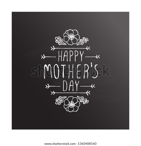 Happy mothers day\
handlettering element with flowers on chalkboard background.\
Suitable for print and\
web