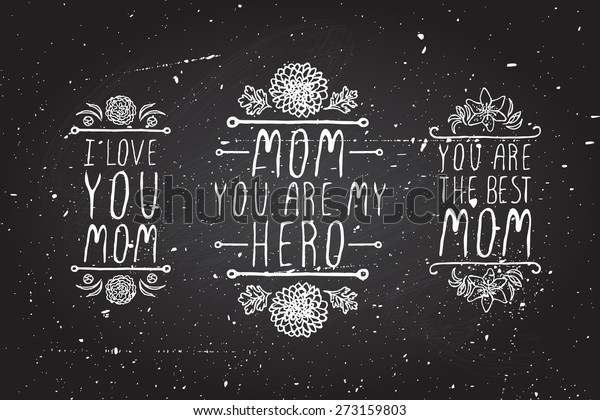 Happy mothers day handlettering elements with\
flowers on chalkboard\
background