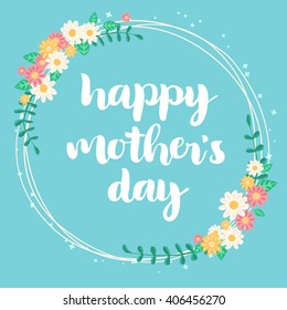 Happy mother's day lettering card. Floral circle frame on light blue background.