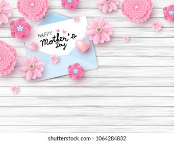 Happy mothers day on white paper in envelope and pink flower with heart on wood texture background with copy space vector illustration