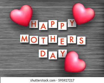 Happy Mother's Day text design with glossy heart shaped balloons on creative wooden background.