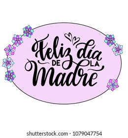 Happy Mother's Day text in Spanish 
 (Feliz Dia de la Madre). Festivity text in oval frame. Hand drawn lettering typography poster on pink background. Text card invitation, template. Vector.