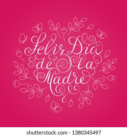 Happy Mother's Day. White ink calligraphy on pink background. Heart shape. Used for greeting card, poster design. Hand drawn spanish lettering with decoration. Feliz dia de la madre.