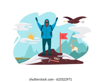 Happy mountaineer on top mountain