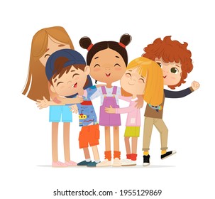 Happy multi aged friends hug each other. School boys and girls kids hugging.