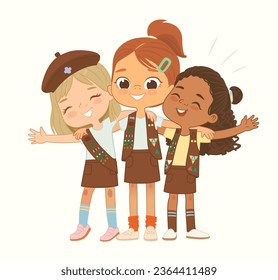 Happy multi ethnic multi aged Brownies girls scout hug. Girls Scout happily hug and smile. Girl together. Brownies Girls Scout