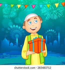 Happy Muslim boy with gift on shiny mosque silhouette background for Islamic festival, Eid Mubarak celebration.