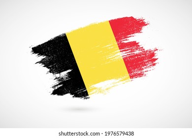 Happy national day of Belgium with vintage style brush flag background