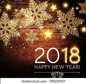 Happy New 2018 Year Background with Shining Gold Textured Snowflakes on Wood Texture. Vector illustration