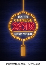 Happy new Chinese year 2018. Neon sign, bright poster, glowing banner, night neon sign, invitation, card. Dog of the zodiac of the Chinese calendar. Vector illustration for your holiday projects