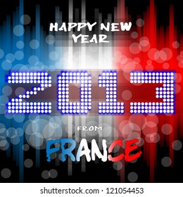 Happy New Year 2013 from France - Happy new year's eve with a multicolored background, bright text like little light ball and the colors of the Franch flag, blue white red. France.