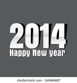 Happy New Year 2014 celebration concept with text on grey background. 