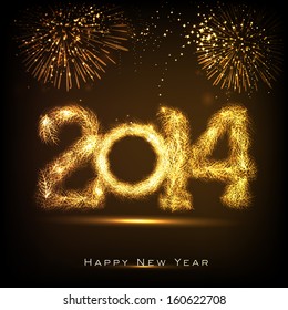 Happy New Year 2014 celebration concept with golden text on beautiful fireworks in the night. 