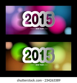 Happy New Year 2015 banners on blurred background with papercut year, vector illustration