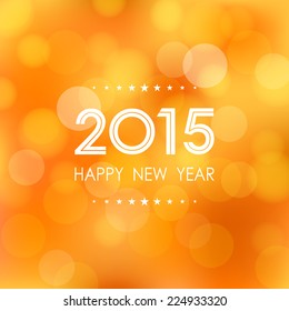 happy new year 2015 in bokeh and lens flare pattern on summer orange background (vector)