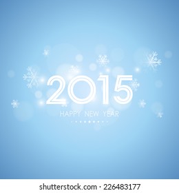 happy new year 2015 with bokeh and snow flake pattern on blue background (vector)