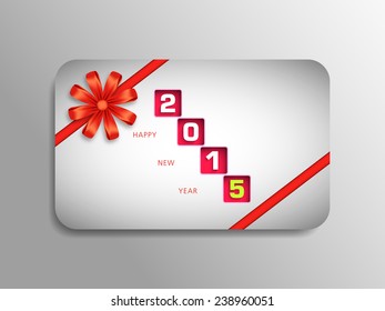 Happy new year 2015 gift card with stylish ribbon.
