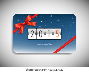 Happy new year 2015 gift card with stylish ribbon.