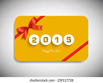 Happy new year 2015 gift card with stylish ribbon.