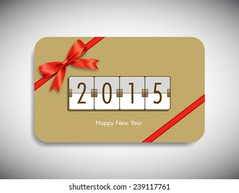 Happy new year 2015 gift card with stylish ribbon.