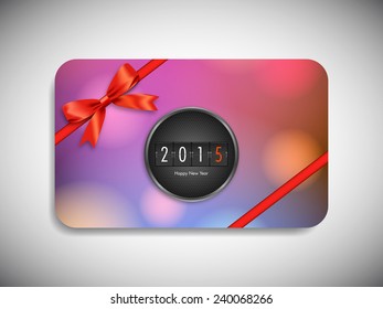 Happy new year 2015 gift card with stylish ribbon.