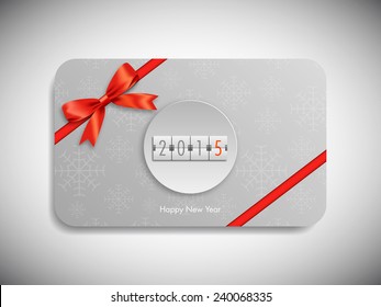 Happy new year 2015 gift card with stylish ribbon.