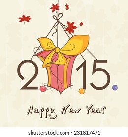 Happy New Year 2015 greeting card design with hanging stylish text and gift box on beige background.