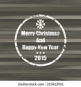 Happy new year 2015 stamp on the wooden background. 