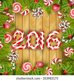 Happy new year 2016 with concept lollipops and pine tree on wooden background.vector
