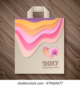 Happy New Year 2017 and christmas template on the wooden background. Year of rooster design for paper bag. Vector illustration