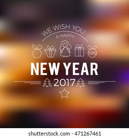 Happy New Year 2017 greeting card with stylish icons and blured background