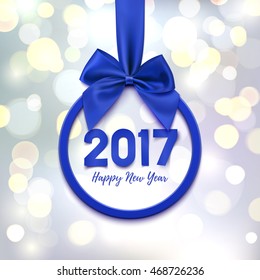 Happy New Year 2017 round banner with purple ribbon and bow,  on abstract background with  bokeh circles. Christmas tree decoration. Greeting card, poster or brochure template. Vector illustration.