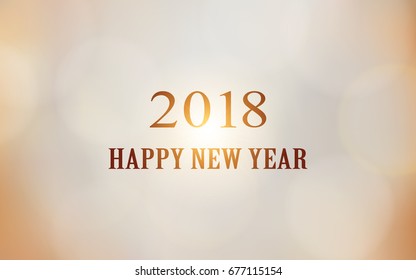 happy new year 2018 with bokeh and lens flare pattern on yellow color background