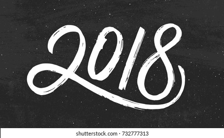 Happy New Year 2018 greeting card design with typography text on black chalkboard background. Vintage vector illustration with hand drawn lettering for chinese year of the dog
