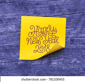 Happy New Year 2018 text on yellow sticky note paper over violet wooden background. Vector illustration