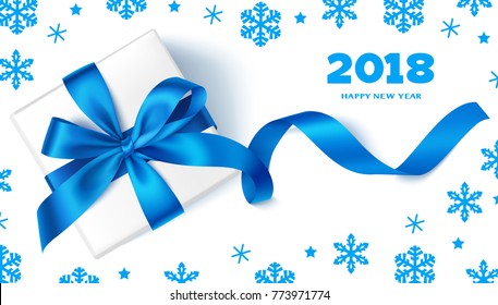 Happy New Year 2018.Decorative New Year background with gift box, blue bow, snowflakes and 
2018 greeting text. Winter holiday template design