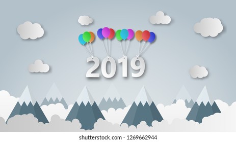 Happy new year 2019 creative illustration paper cut style. 2019 paper cut hanging at colorful balloon over mountains background for web banner, postcard, poster, flyer, leaflet, sale, advertising.