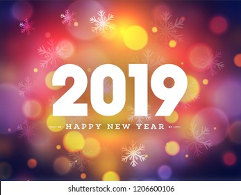 Happy New Year 2019 text on snowflake decorated bokeh background. Can be used as greeting card design.