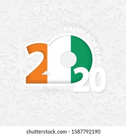 Happy New Year 2020 for Ivory Coast on snowflake background. Greeting Ivory Coast with new 2020 year.