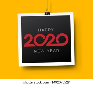 Happy New Year 2020 text design. Cover of business diary for 2020 with wishes. Brochure design template, card, banner. Vector illustration. Isolated on yellow background.